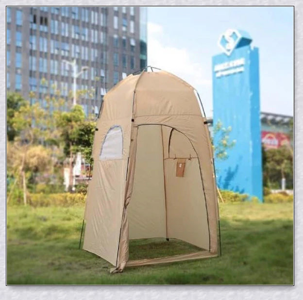 Portable camping shower tent in green, blue, and grey colours, providing instant privacy for outdoor activities