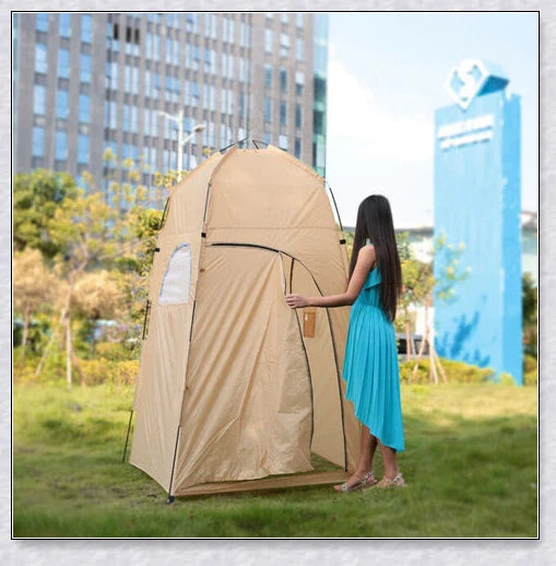 Portable camping shower tent in green, blue, and grey colours, providing instant privacy for outdoor activities