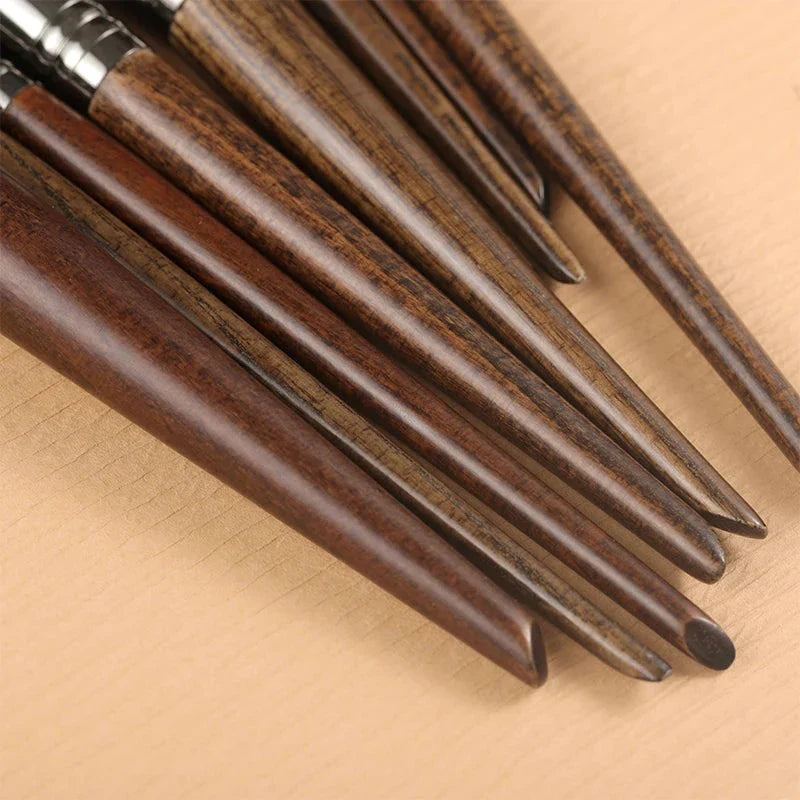 A set of 9 premium makeup brushes with soft goat hair bristles and natural wood handles, designed for flawless makeup application.