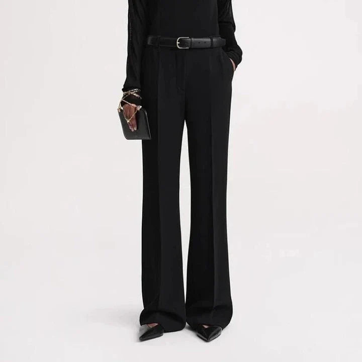 Elegant high-waist flared trousers for women, featuring a sleek boot-cut design and a comfortable, flattering fit.