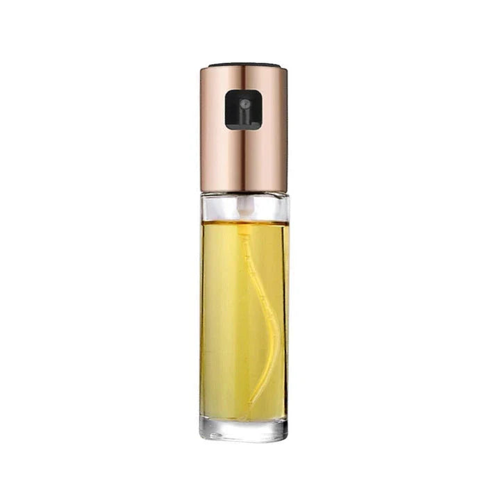 Premium Glass and Stainless Steel Oil Spray with a gold-coloured cap, designed to elevate your cooking experience with precision control and style.