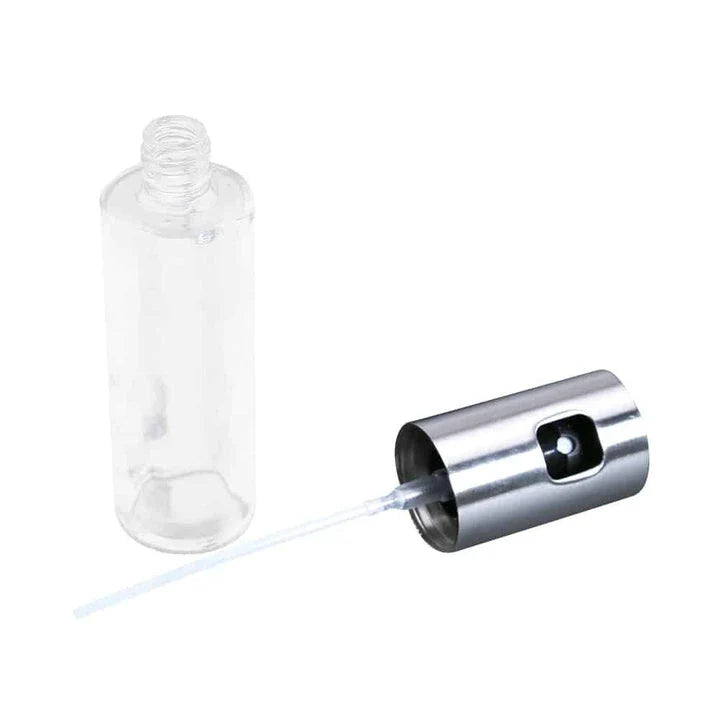 Premium Glass and Stainless Steel Oil Spray with a gold-coloured cap, designed to elevate your cooking experience with precision control and style.