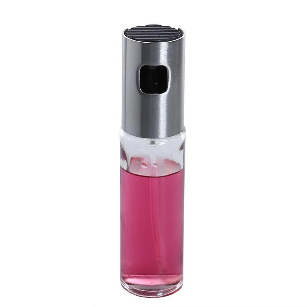 Premium Glass and Stainless Steel Oil Spray with a gold-coloured cap, designed to elevate your cooking experience with precision control and style.
