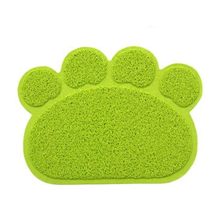 Colourful pet feeding mat made of durable PVC material, with a vibrant green design and slip-resistant surface to keep bowls in place during mealtimes.
