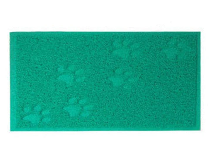 Colourful pet feeding mat made of durable PVC material, with a vibrant green design and slip-resistant surface to keep bowls in place during mealtimes.