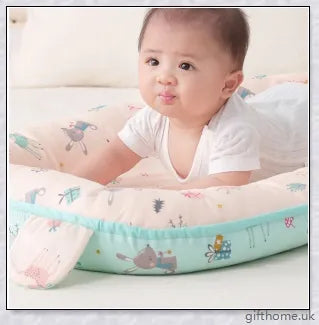 A cozy, anti-shock and anti-pressure baby sleeping crib with adorable animal print designs, providing a safe and comfortable sleeping environment for infants.