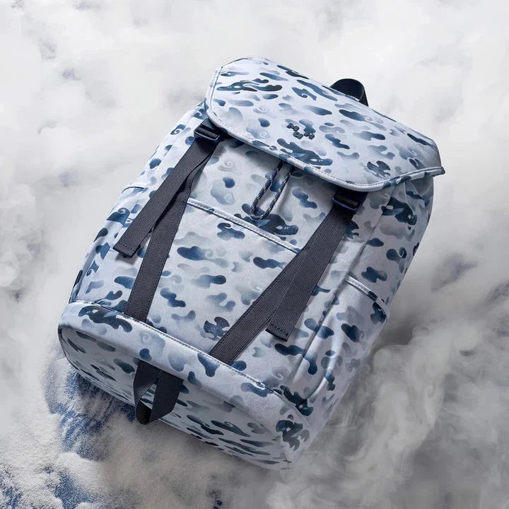 A premium backpack with a stylish dragon camouflage design, featuring a spacious interior, comfortable straps, and secure closures for the modern student.