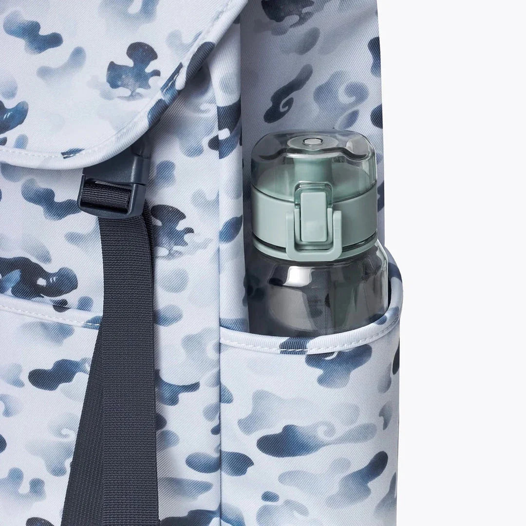 A premium backpack with a stylish dragon camouflage design, featuring a spacious interior, comfortable straps, and secure closures for the modern student.