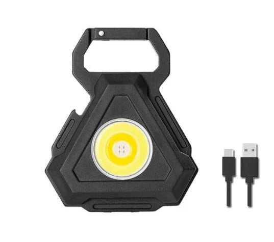 Powerful USB-rechargeable keychain flashlight with three lighting modes, magnetic base, and foldable handle for outdoor and emergency use