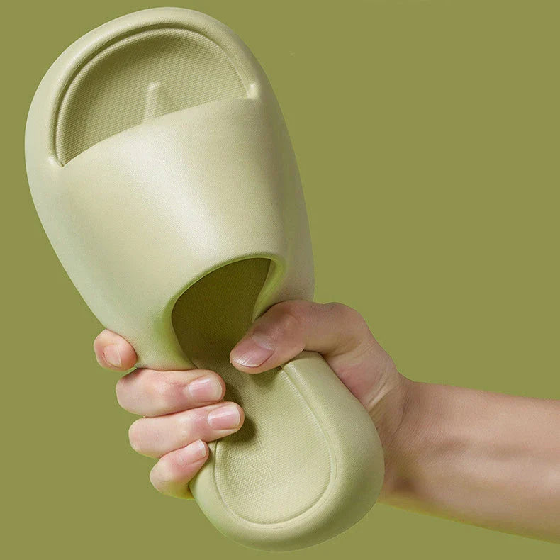Comfortable EVA foam slip-on slippers in various colors, featuring non-slip soles and a breathable design for indoor and bathroom use.