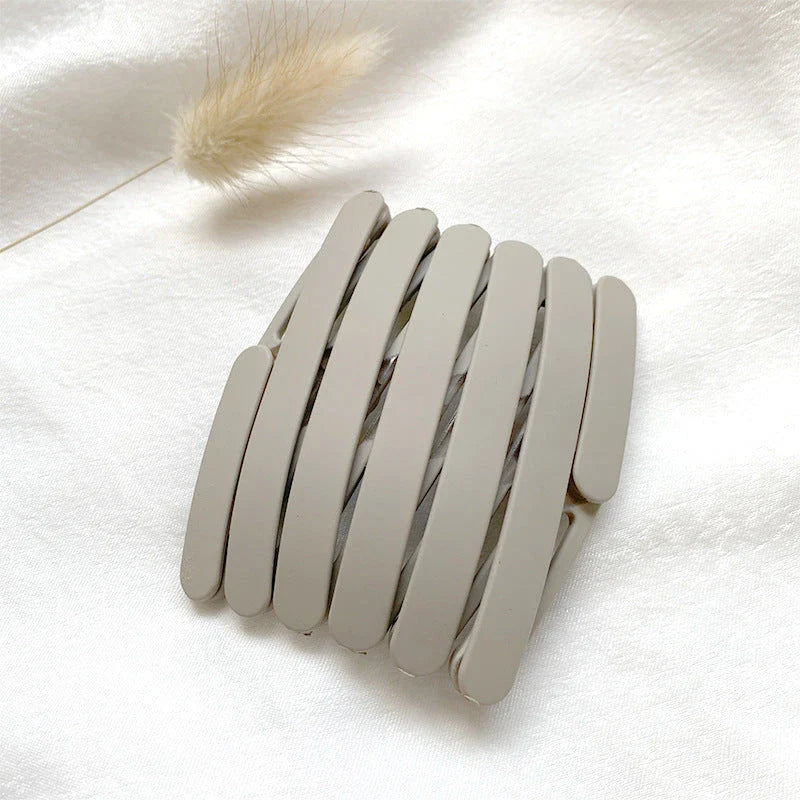 Retractable Pocket Hair Band - A stylish, secure, and convenient hair accessory that can be easily stored in your pocket or bag.