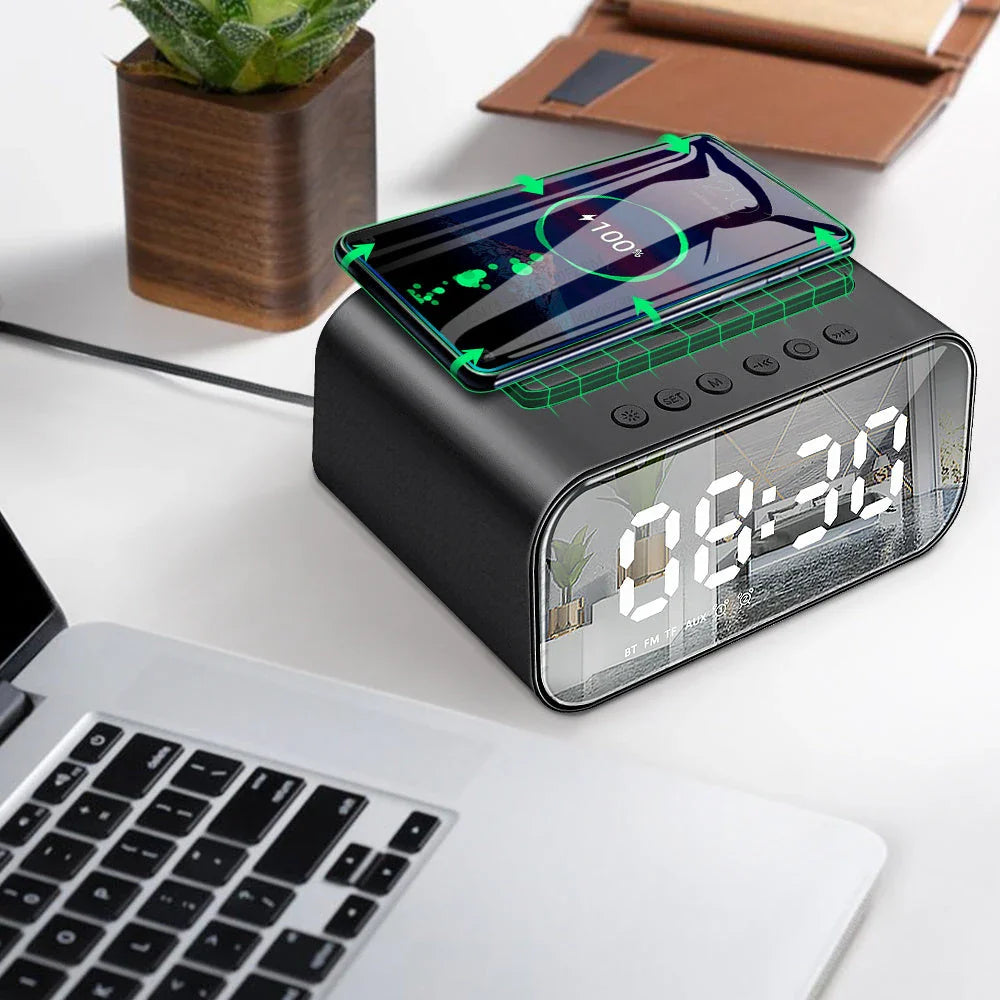 Versatile wireless charging Bluetooth speaker alarm clock with LED display, compact and sleek design.