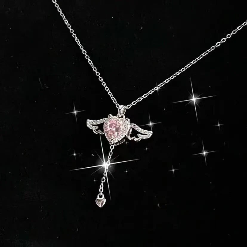 Enchanting necklace with Cupid heart and fluttering angel wings, crafted with titanium steel and sparkling zircon crystals