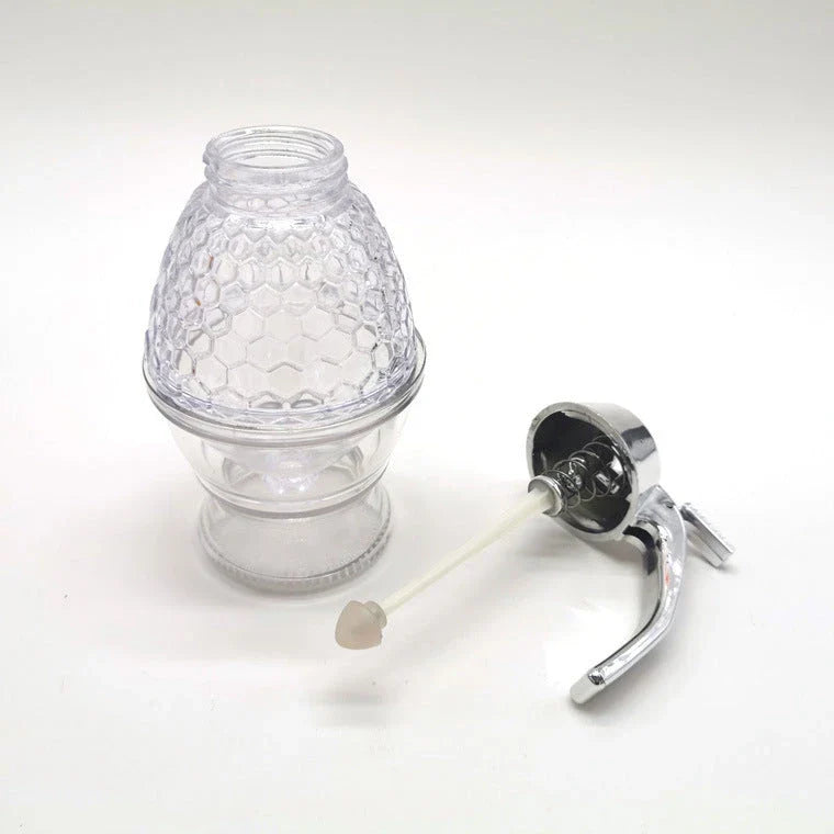 Premium acrylic honey dispenser with transparent body and precise spout for drip-free honey serving
