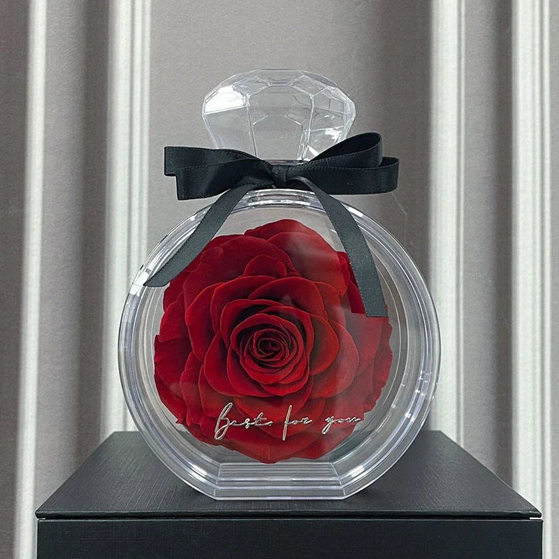 Preserved Rose Flower Ornaments in various colors, including red, pink, plum, and sapphire blue, displayed in a stylish gift box.