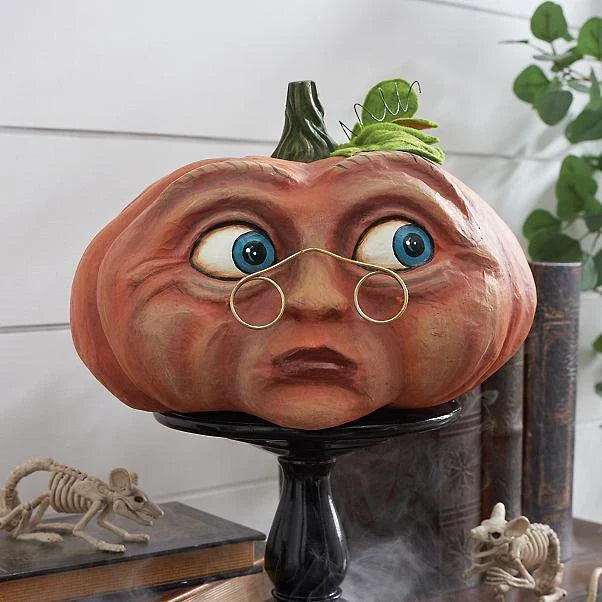 A collection of hand-crafted pumpkin decorations in various sizes, perfect for adding an enchanting touch to your Halloween celebrations.
