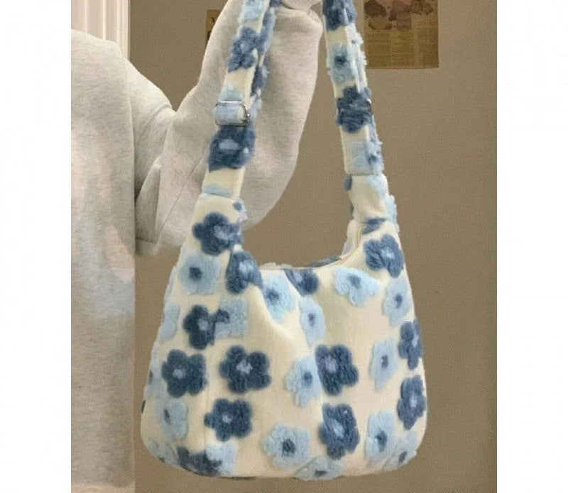 Large capacity fur bag with floral elements and adjustable straps