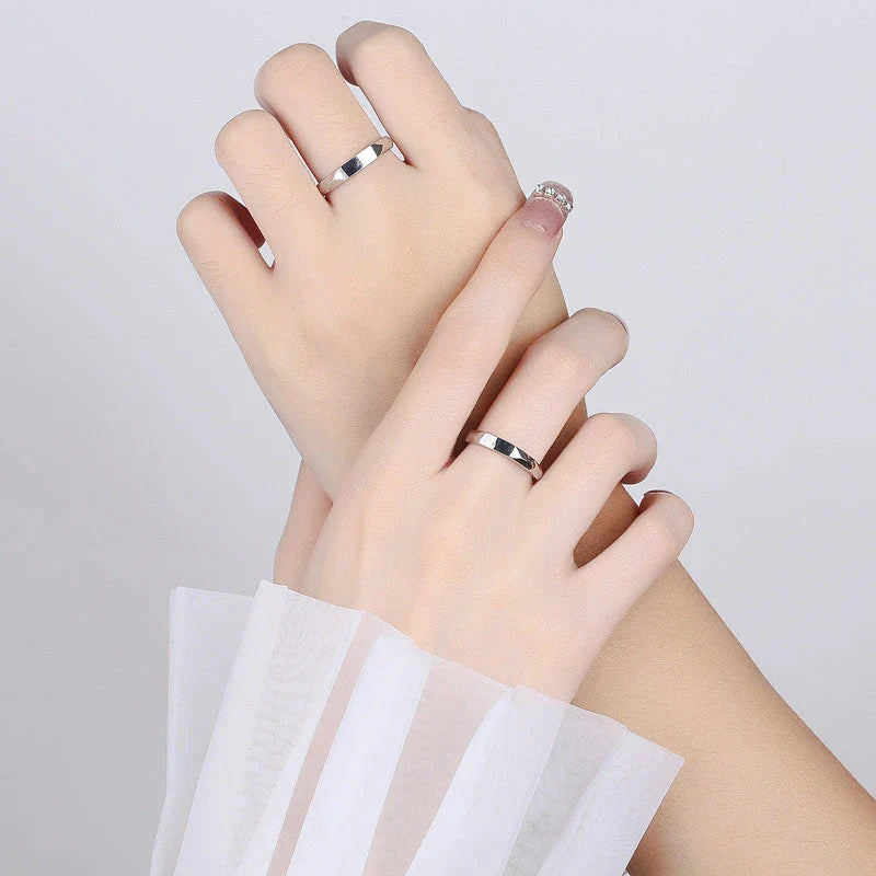 Stylish sterling silver rings with a hidden love pattern design, perfect for romantic gifts or personal accessorizing.