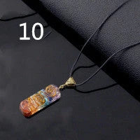 A stunning chakra crystal pendant with natural patterns and organic imperfections, showcasing the beauty of nature.