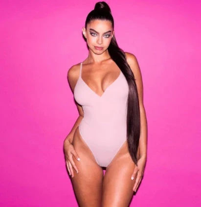 Stylish backless one-piece swimsuit in various vibrant colors for curvy women