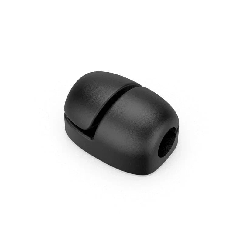 Premium silicone cable clips in various colours for organising and managing cables on desks, entertainment units, and other surfaces