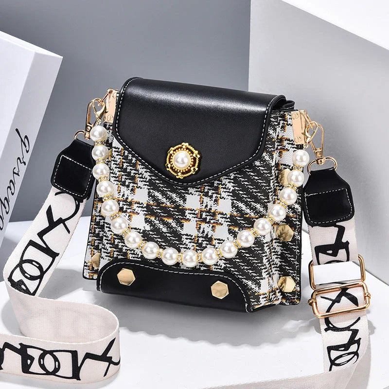 Premium crossbody phone bag with elegant pearl charm, made of durable PU leather and available in multiple color options