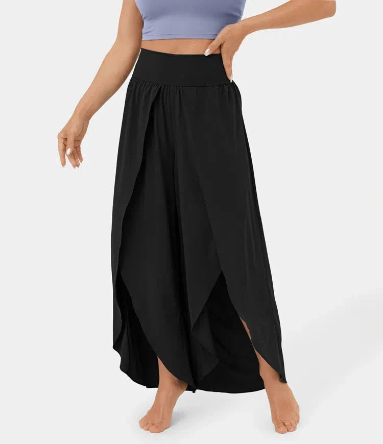 Versatile high-waist split-leg yoga trousers in a variety of colours, featuring a wide-leg silhouette and elasticated waistband for comfort and style.