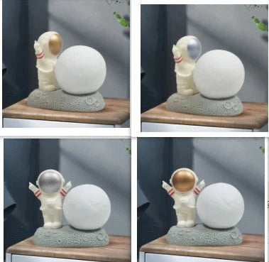 Astronaut-themed colour-changing night lamp with durable natural resin construction