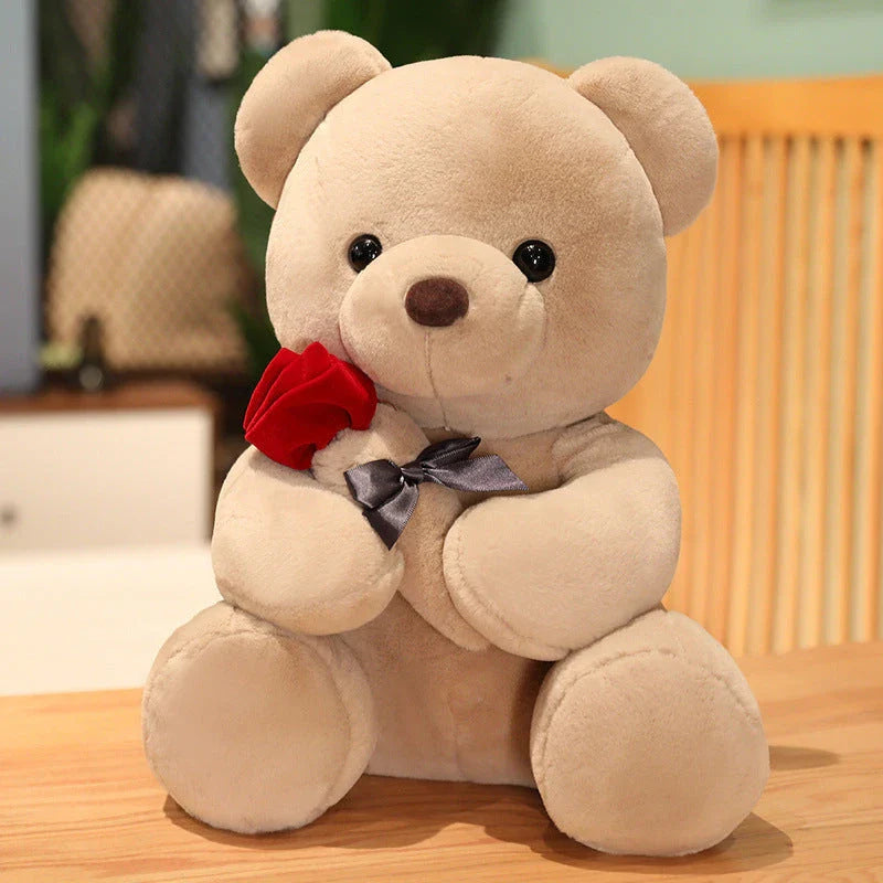Soft and huggable teddy bear plush pillow in brown, beige, and grey colors
