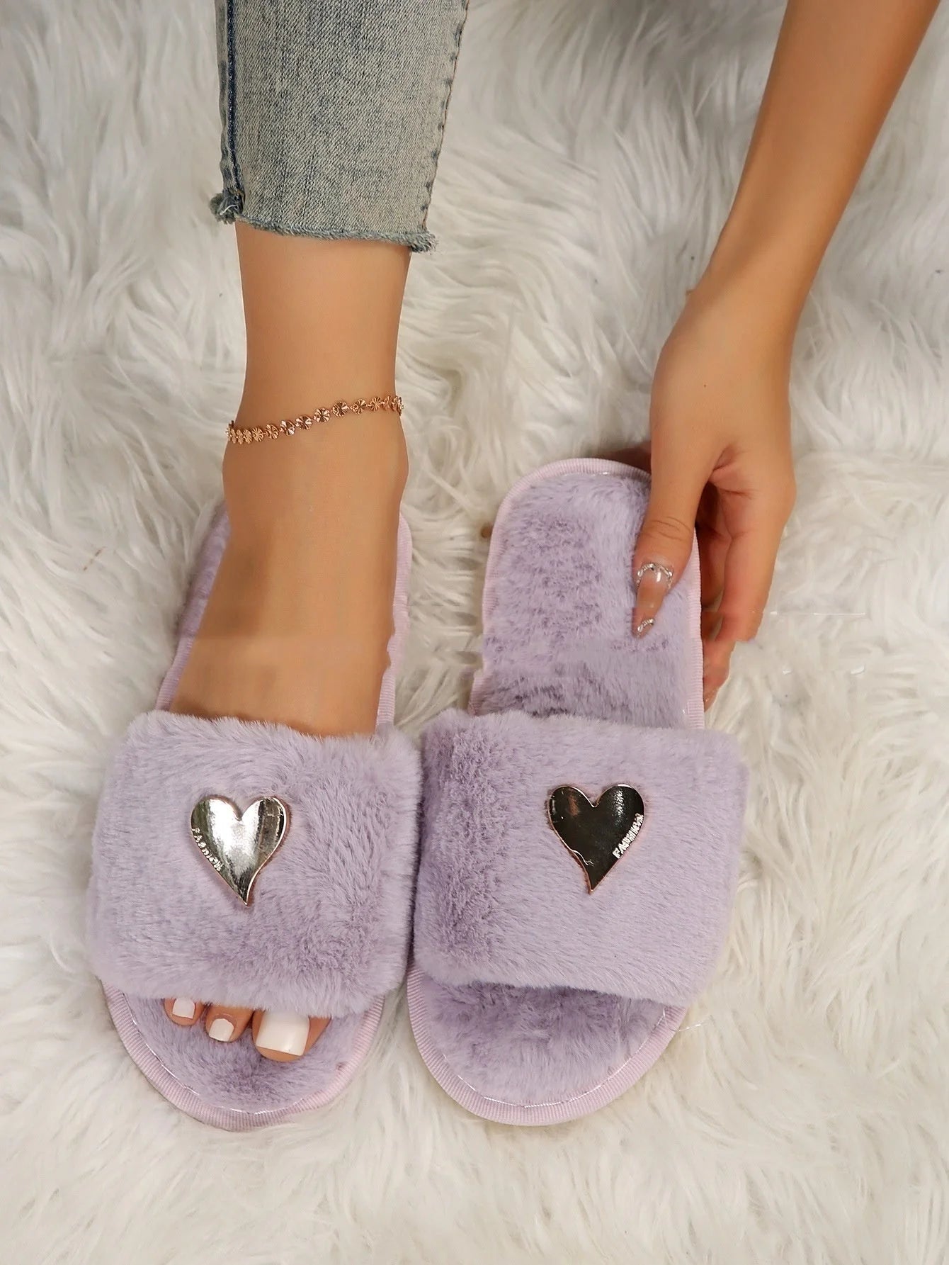 Cosy faux fur slippers in various colours for comfortable indoor wear