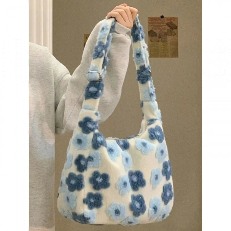 Large capacity fur bag with floral elements and adjustable straps