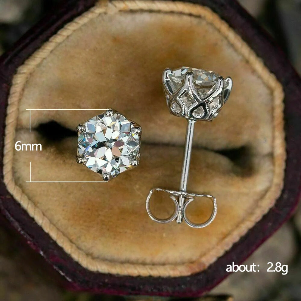 Elegant six-claw diamond zircon ear studs in white gold-toned finish, a fusion of traditional and contemporary style