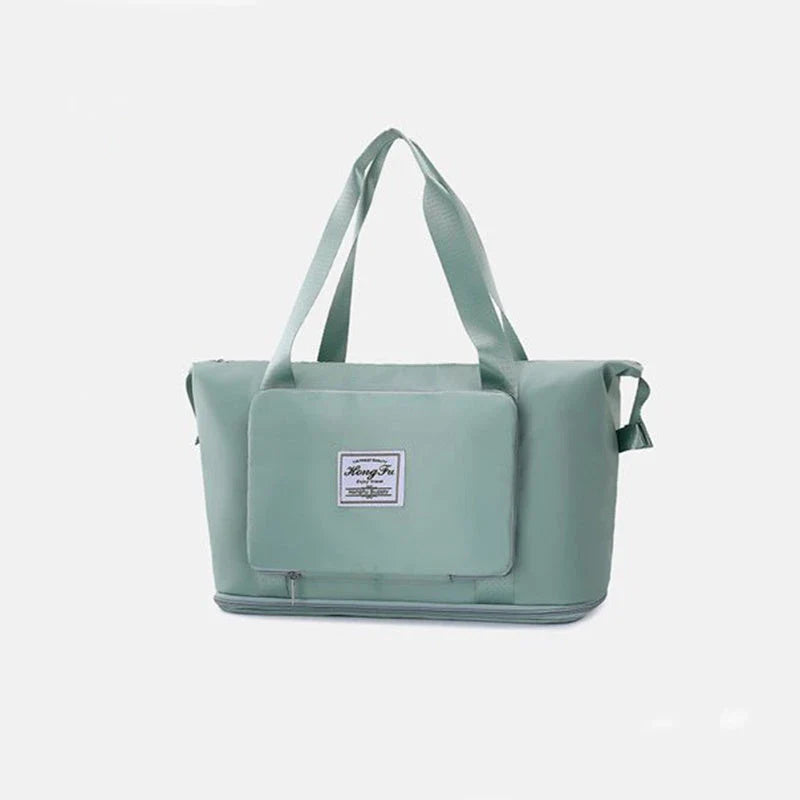 Expandable travel duffel bag with adjustable shoulder strap, multiple interior pockets, and water-resistant Oxford cloth material