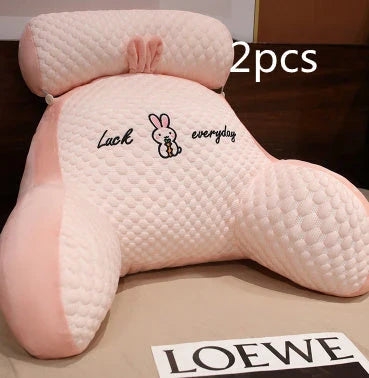Plush lumbar cushion with ergonomic design for comfortable back and neck support on sofa, chair, and bed