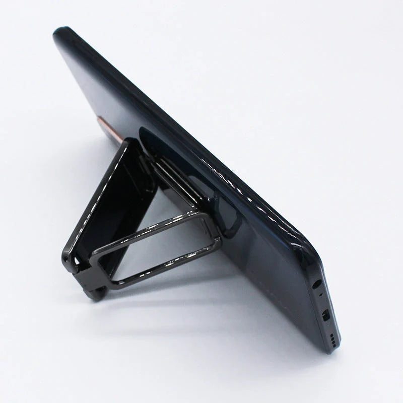 Adjustable folding mobile phone holder stand with multi-angle design, compatible with various smartphones and tablets