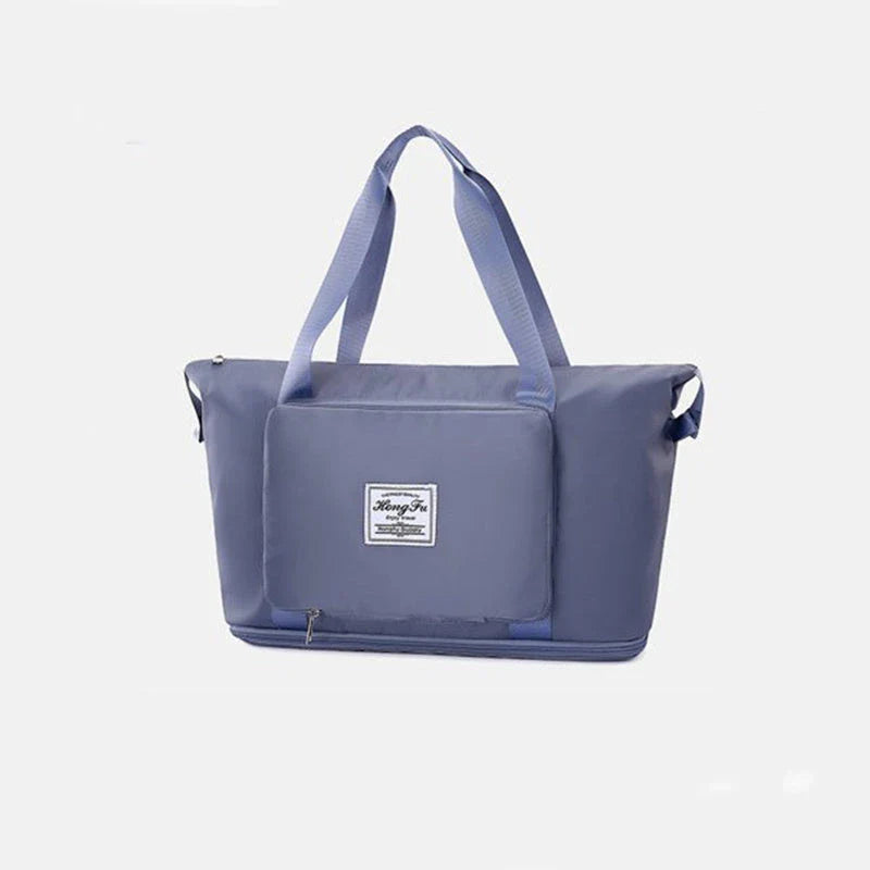 Expandable travel duffel bag with adjustable shoulder strap, multiple interior pockets, and water-resistant Oxford cloth material