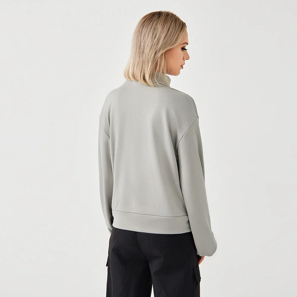 Soft, cosy women's sweatshirt in black, grey, and coffee colours with a relaxed, flattering fit