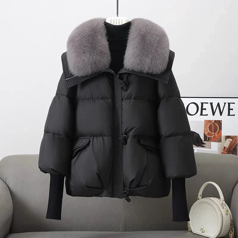 Premium down-filled puffer jacket with faux fur collar, available in brown, black, and white colours
