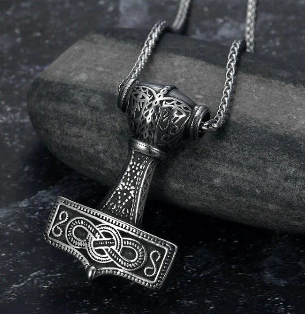 Vintage Norse rune necklaces for men, featuring a range of intricate Viking symbols and designs crafted from premium stainless steel