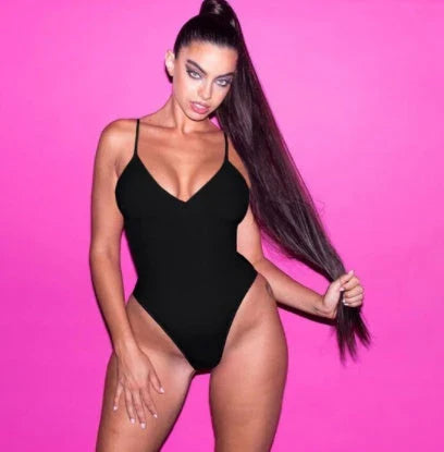 Stylish backless one-piece swimsuit in various vibrant colors for curvy women