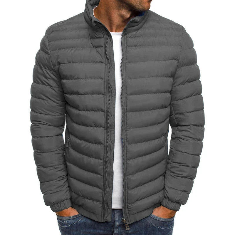 Premium men's insulated jacket in a variety of vibrant colors, featuring a durable, water-resistant outer shell and cozy polyester fiber insulation for warmth and comfort during outdoor activities.