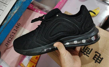 Comfortable black and red air cushion sneakers with lace-up closure for active men