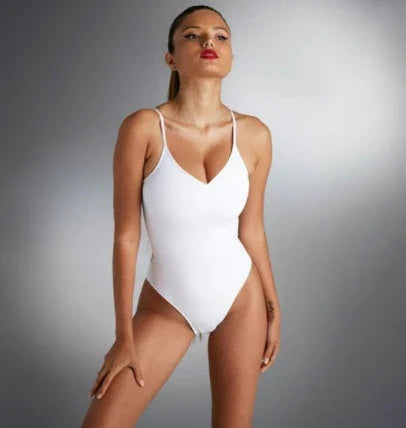 Stylish backless one-piece swimsuit in various vibrant colors for curvy women