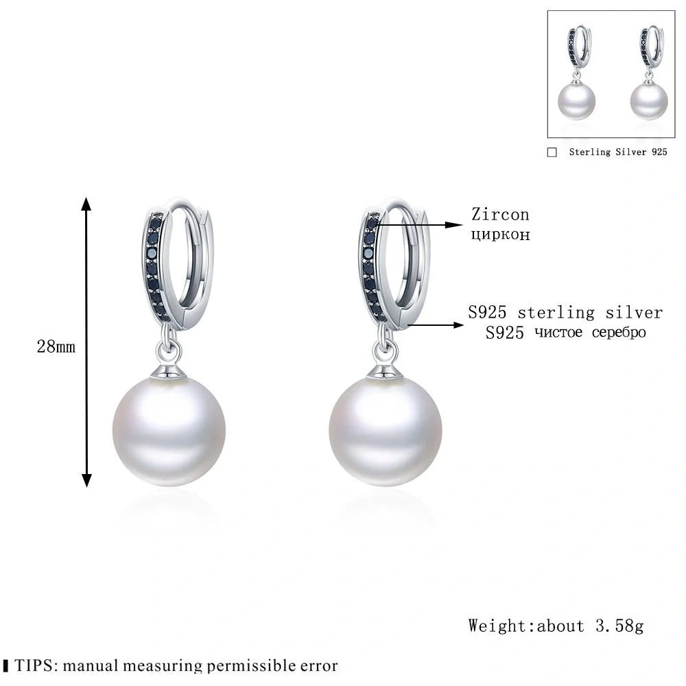 Trendy copper ball stud earrings with a minimalist design, showcasing a sleek and modern accessory for fashion-forward women