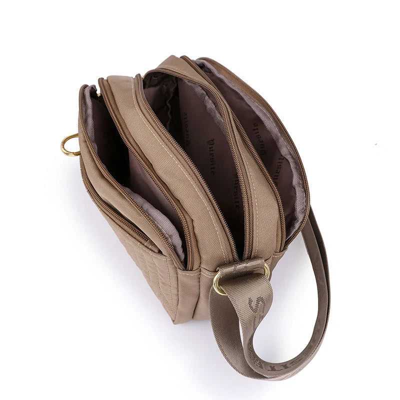 Women's lightweight nylon cross body messenger bag in various colours