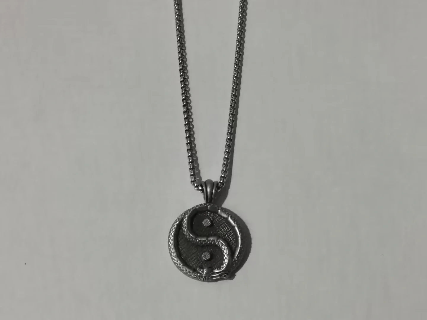 Men's black titanium steel pendant sweater chain with polished finish