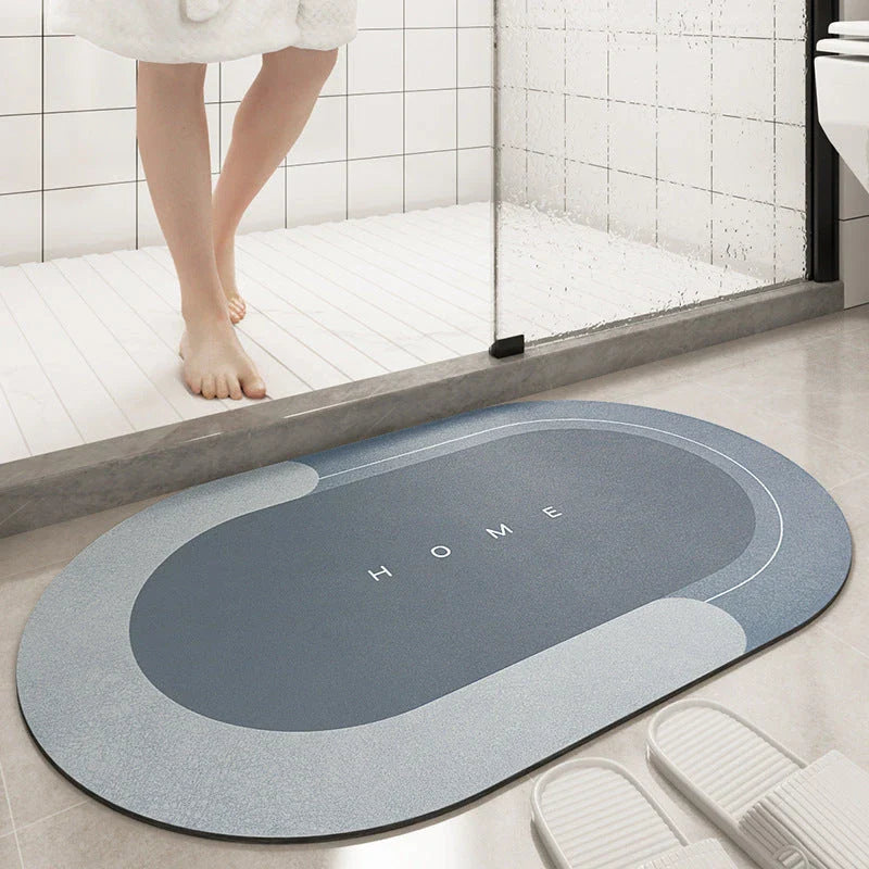 Plush, machine-woven bathroom mat with non-slip surface, available in rectangle and oval shapes in a variety of colours.