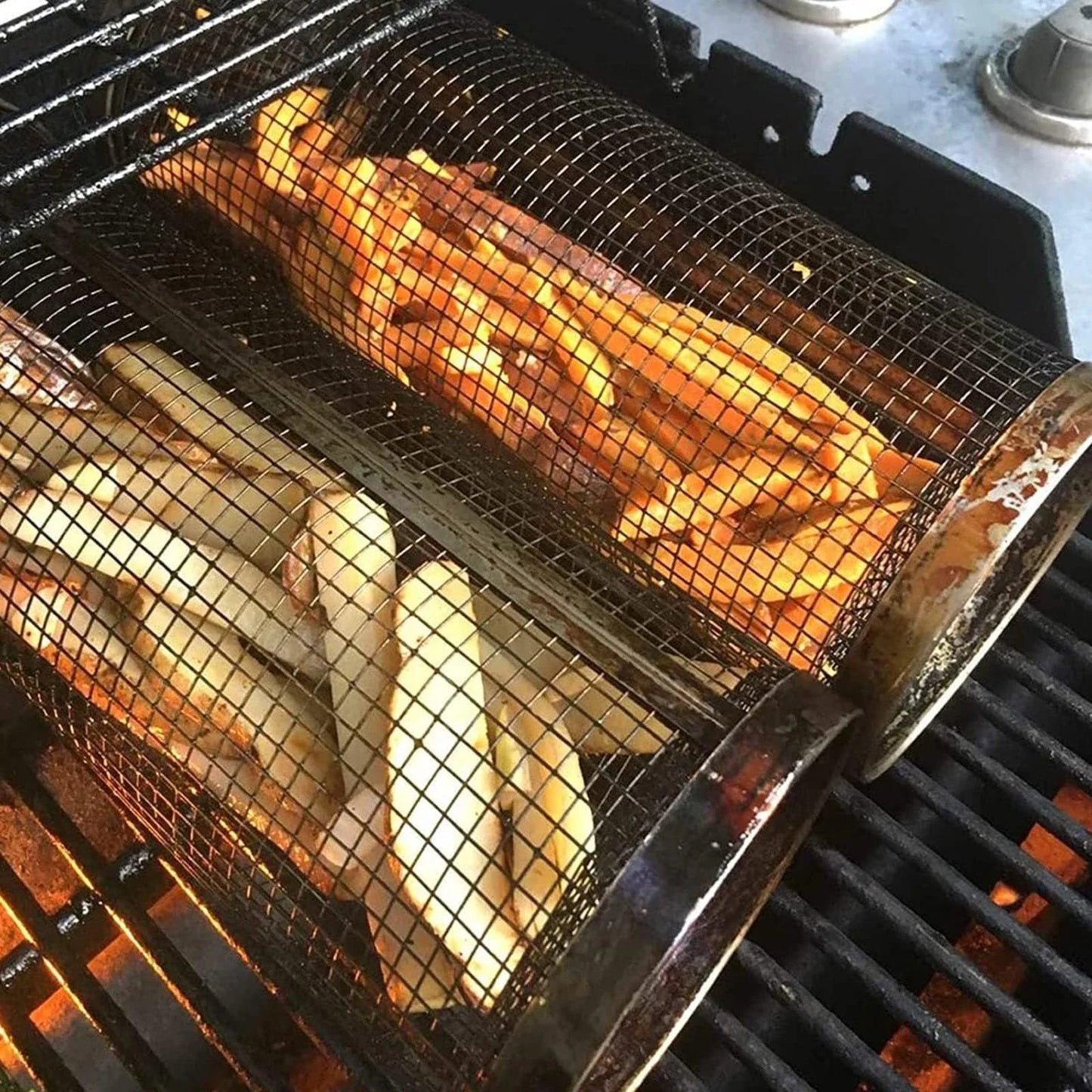 A stainless steel wire mesh grilling basket with a round shape, designed for versatile outdoor cooking and barbecue.