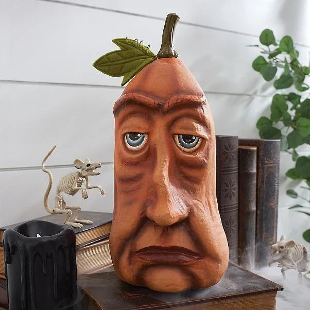 A collection of hand-crafted pumpkin decorations in various sizes, perfect for adding an enchanting touch to your Halloween celebrations.
