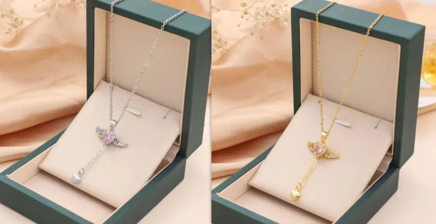 Enchanting necklace with Cupid heart and fluttering angel wings, crafted with titanium steel and sparkling zircon crystals